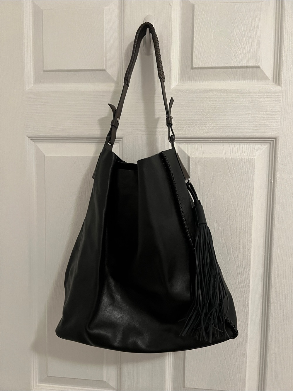 All Saints Black Leather Hobo Bag with Braided Strap and Tassel